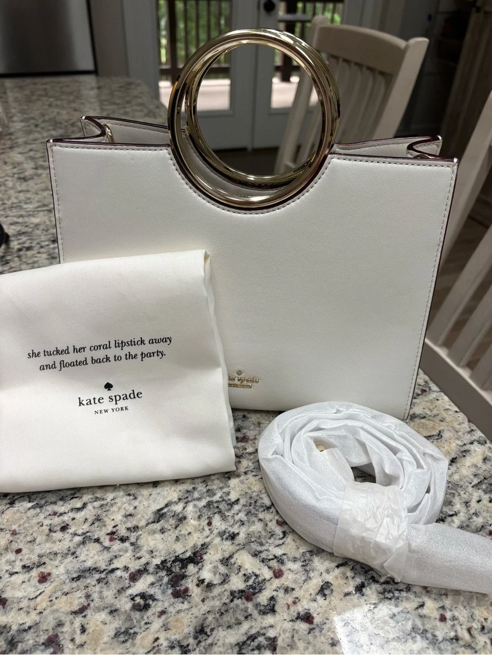 kate spade white leather bag with gold circular handle